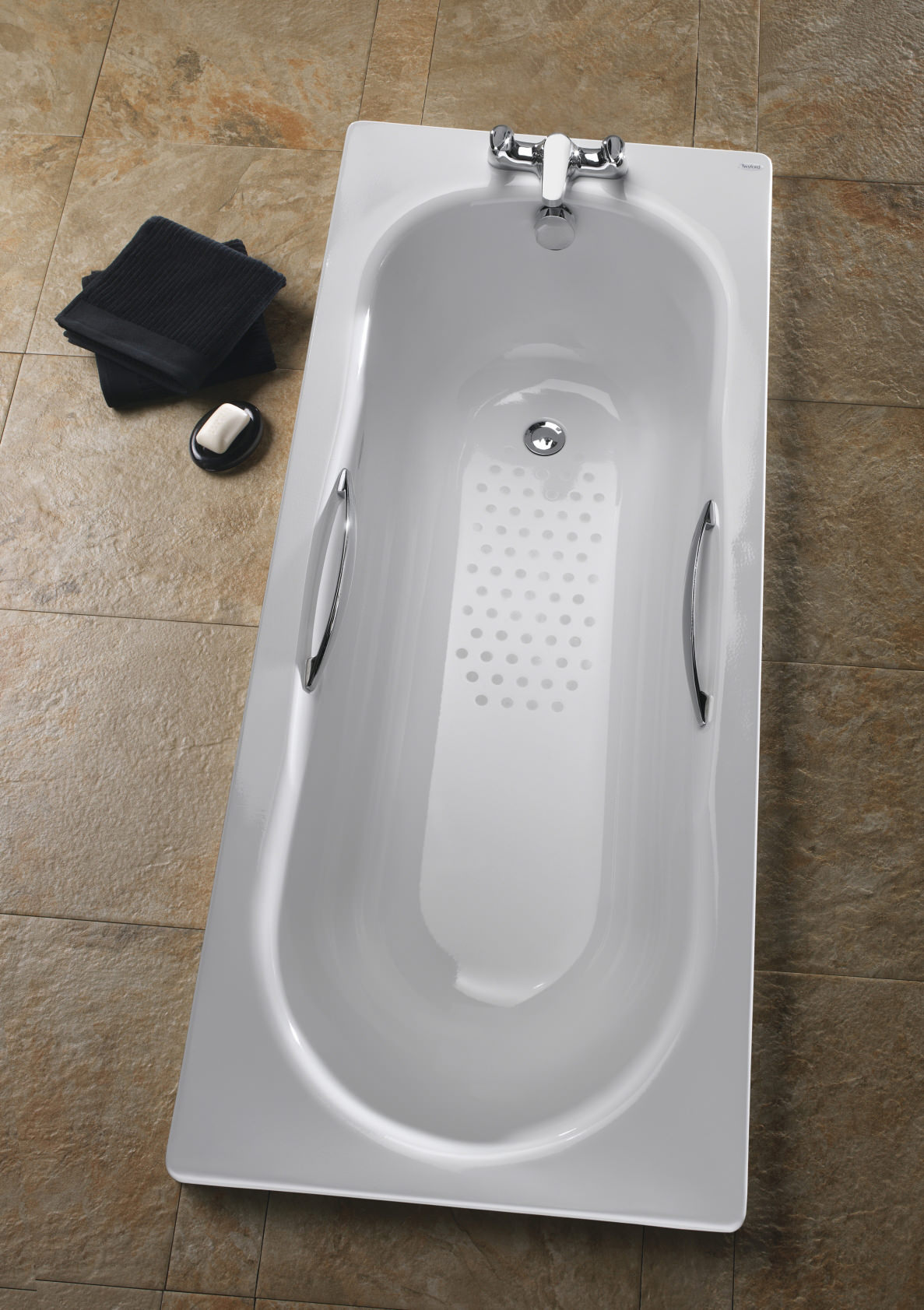 White Twyford Celtic steel single-ended bath with legs and grips, designed for comfortable bathing and easy installation.