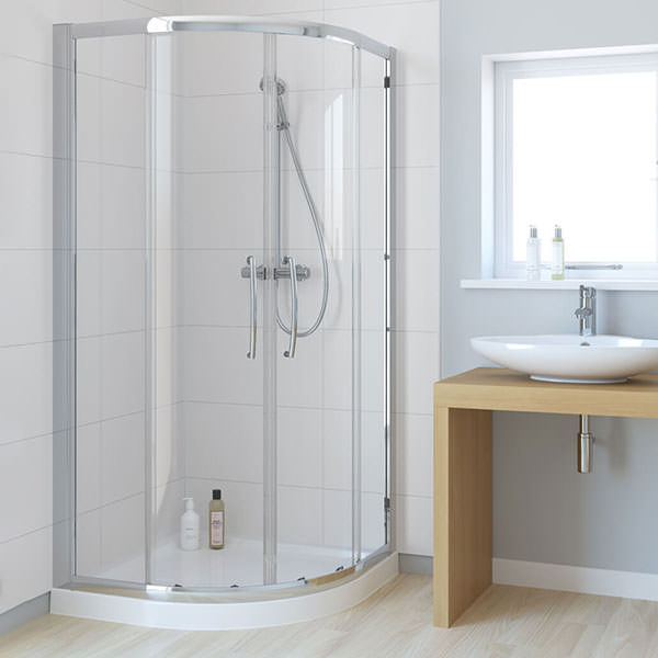 Silver Merlyn Ionic Essence frameless sliding quadrant shower enclosure with double doors, 1200x900mm, in a modern bathroom setting.