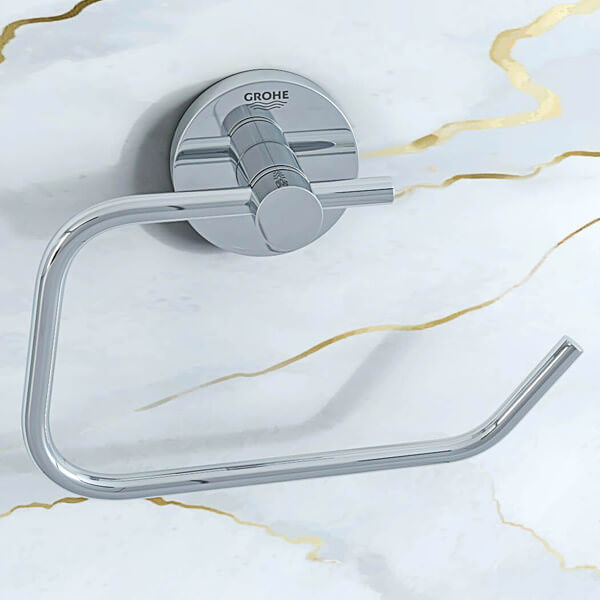 Chrome Grohe Essentials Contemporary Curved Toilet Roll Holder mounted on bathroom wall with sleek design