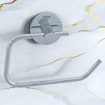 Chrome Grohe Essentials Contemporary Curved Toilet Roll Holder mounted on bathroom wall with sleek design