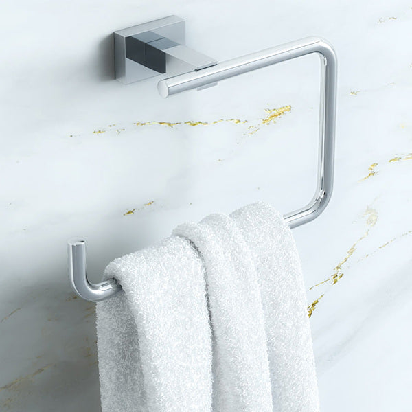 Chrome Grohe Essentials Cube towel ring mounted on a bathroom wall, featuring a sleek and modern design.