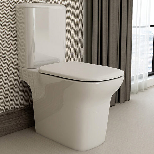 White IMEX Grace rimless comfort height toilet with cistern and soft-close seat, open-back design, 360x650mm size.