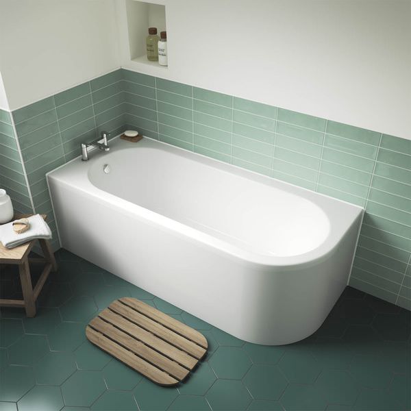 White Nuie Crescent Back To Wall Bath by Tuskan Tiles, asymmetric corner design, 1700 x 725mm, with smooth curved edges