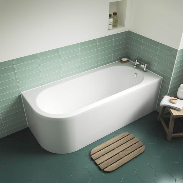 Nuie Crescent back-to-wall white bath by Tuskan Tiles, asymmetric corner design, 1700 x 725mm, with smooth curved edges.