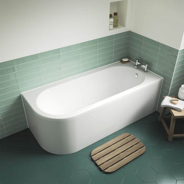 Nuie Crescent back-to-wall white bath by Tuskan Tiles, asymmetric corner design, 1700 x 725mm, with smooth curved edges.