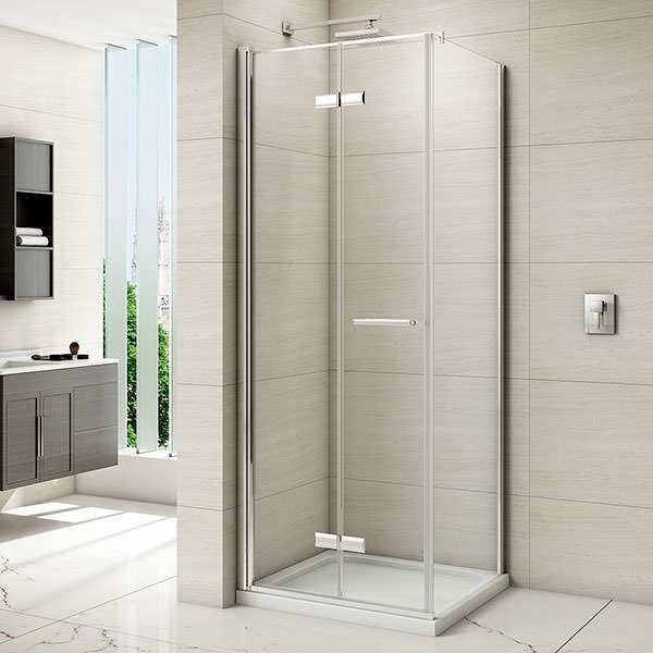 Merlyn 8-Series frameless hinged bifold shower door with clear glass, reversible design, shown in a modern bathroom setting