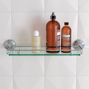 Traditional glass shelf with chrome holder by Hudson Reed, mounted on a wall with a sleek, modern design for bathroom decor.