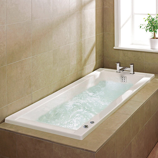Aqua Atlanta square single-ended whirlpool bath by Tuskan Tiles, featuring a sleek white design and built-in whirlpool jets.